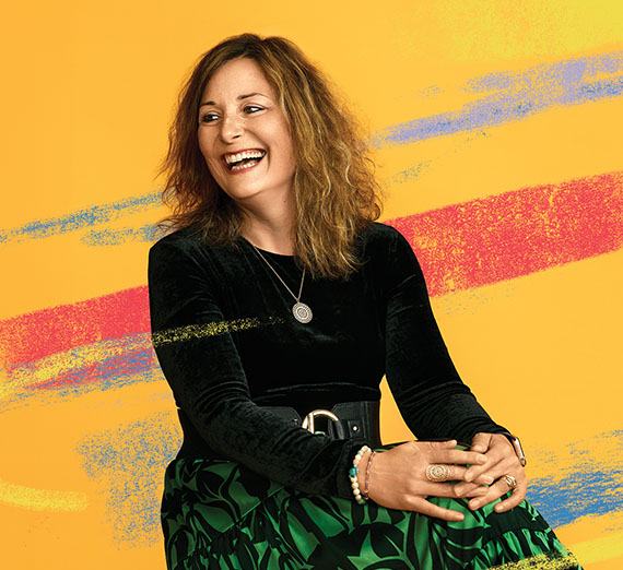 Illustration of a student writing while an AI robot with an exposed brain sits beside him.